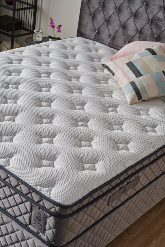 Čalouněná postel DELUXE s matrací - šedá