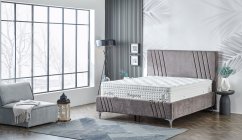 Čalouněná postel ELEGANCE NEW s matrací - světle šedá